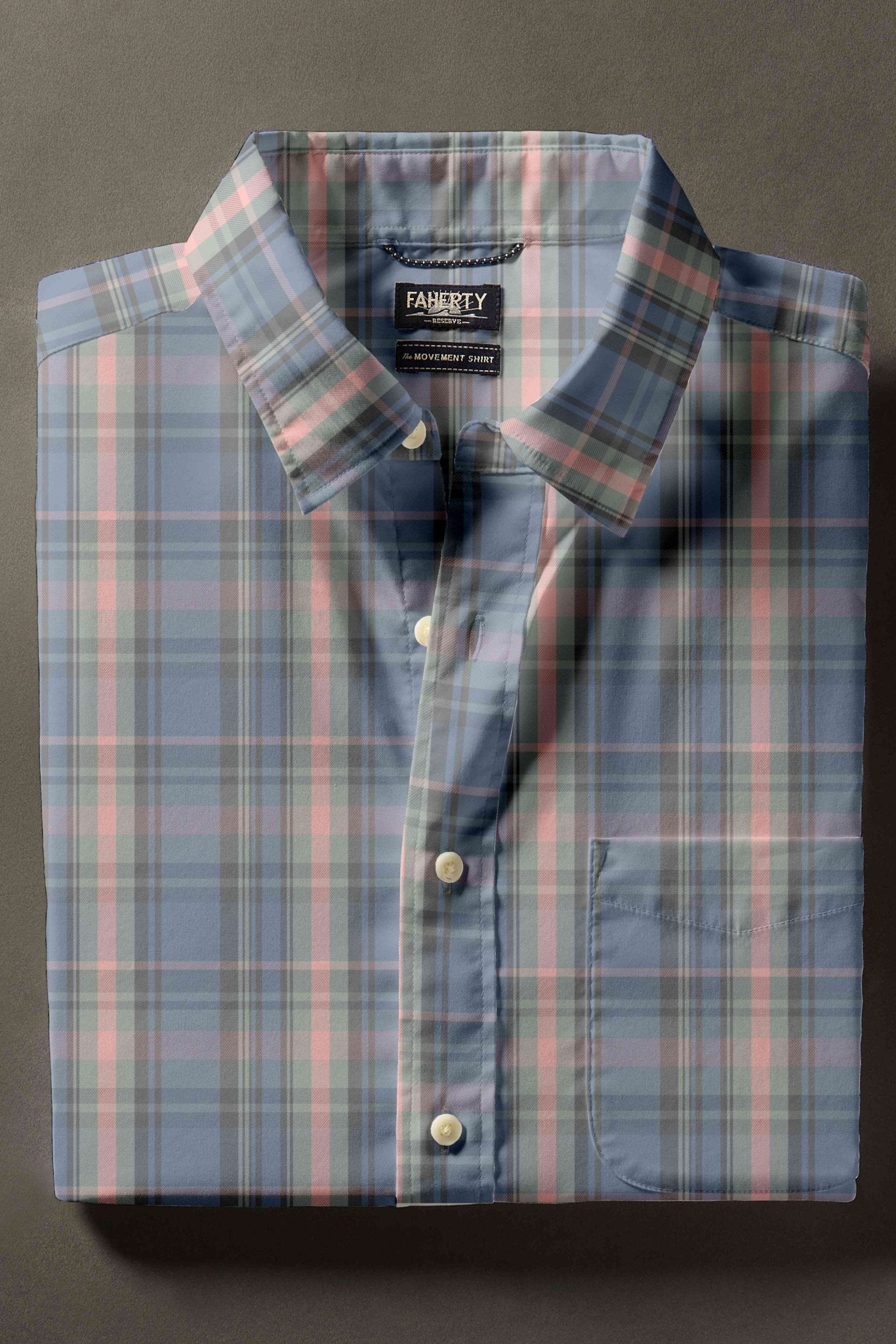 Plaid shirt with collar and buttons on a gray background